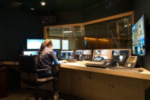 Audiovisual engineer in auditorium control room